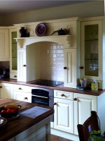 Cream hand-painted in frame kitchen showing hob and cooker unit - designed and fitted by Barrett Kitchens, County Donegal, Ireland