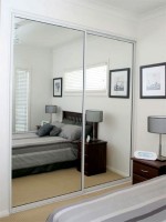 White fitted wardrobe with mirror sliding doors- fitted by Barrett Kitchens, Letterkenny, Co. Donegal, Ireland