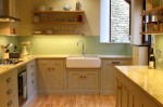 Green and cream hand-painted in frame kitchen with granite worktops -  designed and fitted by Barrett Kitchens, Letterkenny