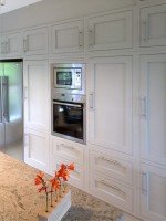 Hand painted in frame kitchen with central unit and granite tops, designed and fitted by Barrett Kitchens, Co. Donegal, Ireland