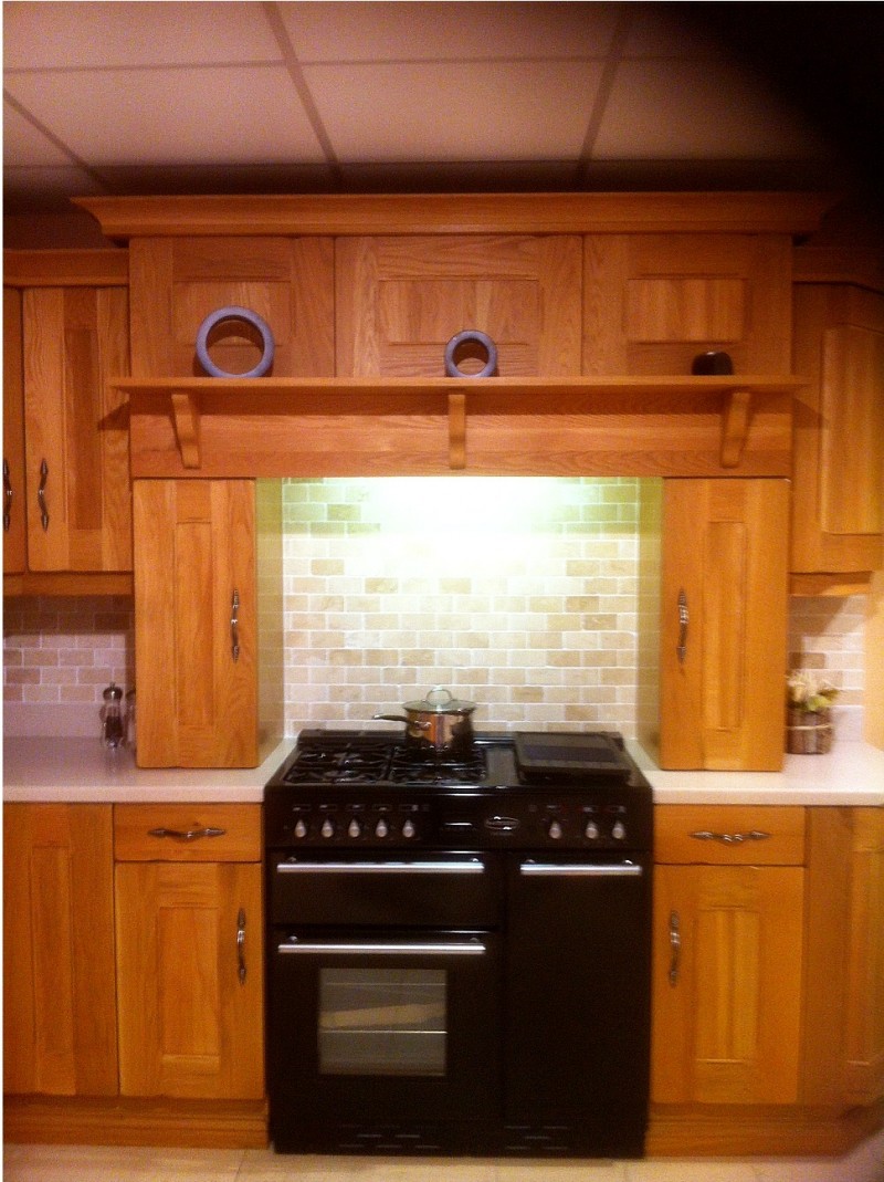 Oak Kitchen showing units around fitted range