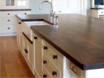 White hand painted in frame kitchen with central sink unit designed and fitted by Barrett Kitchens, County Donegal, Ireland