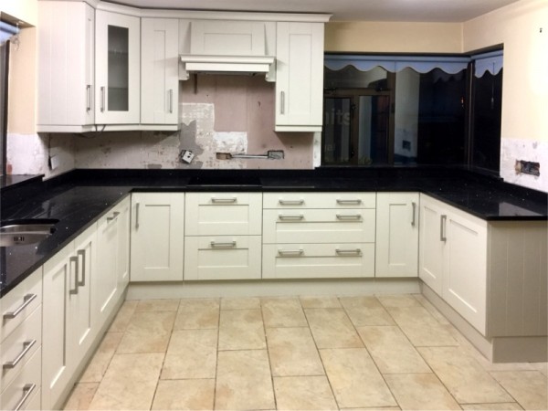 Hand-painted mussel kitchen, combined with dark worktops - designed and fitted by Barrett Kitchens, Donegal, Ireland Hand-painted mussel kitchen, combined with dark worktops - designed and fitted by Barrett Kitchens, Donegal, Ireland