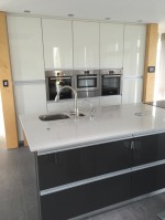 Kitchen during refurbishment to new gloss white units with black worktops - designed and fitted by Barret Kitchens, Letterkenny, Co. Donegal, Ireland
