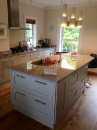 Inframe painted light grey island with granite worktop